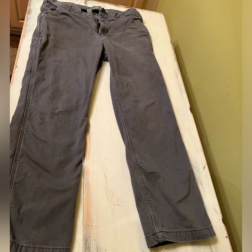 Men’s Carhartt relaxed fit fleece lined 36x32 jeans with side carpenters pocket